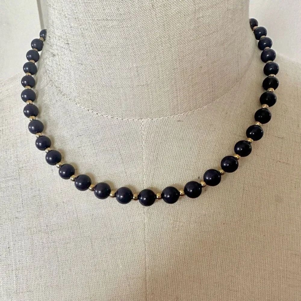 Blue and gold tone beaded necklace